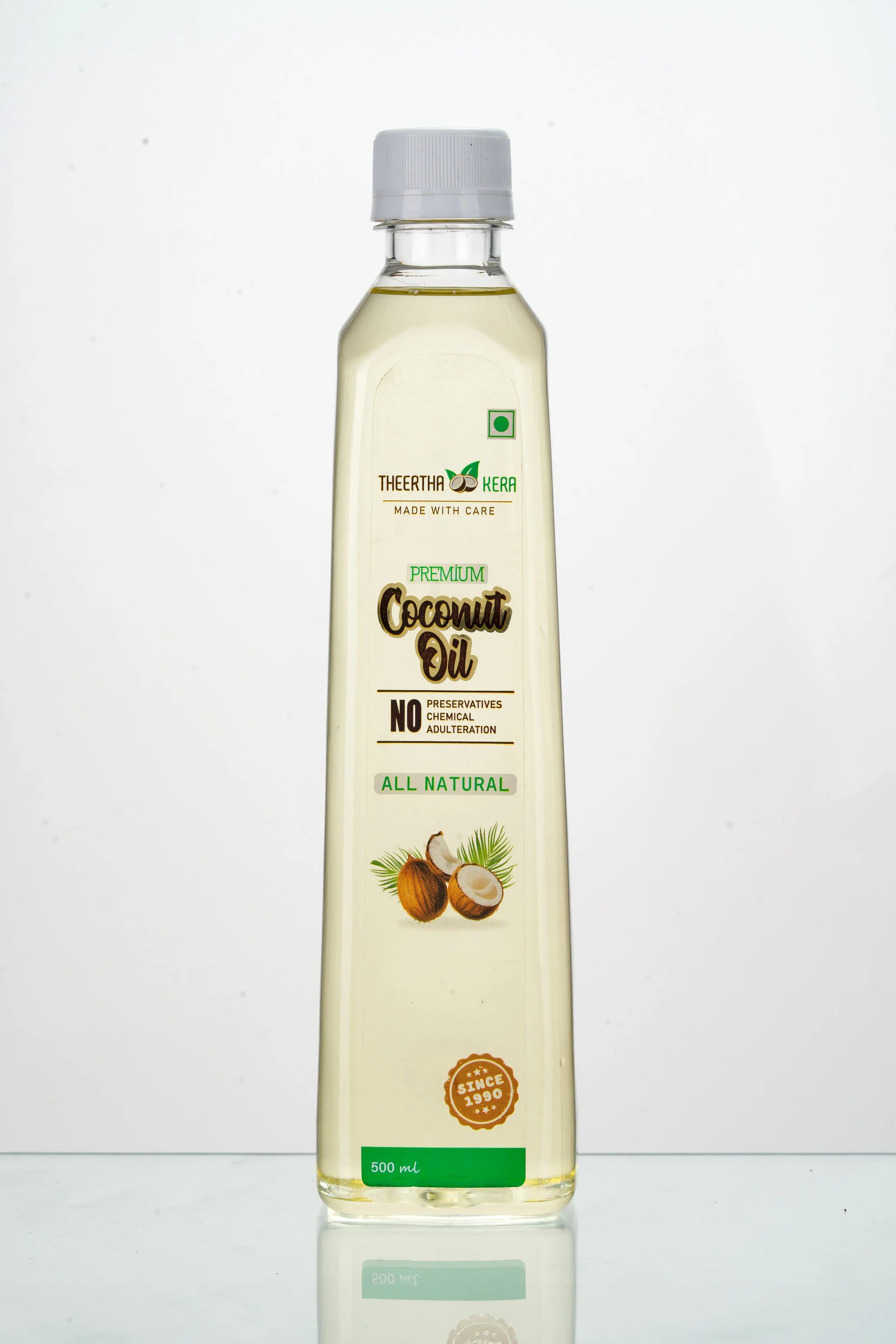 Bottle of coconut oil on a white background