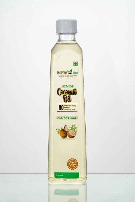 Bottle of coconut oil on a white background